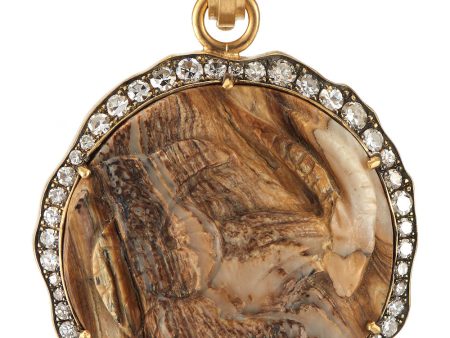 Alaskan Fossilized Coral Carved Capricorn Pendant on Sale